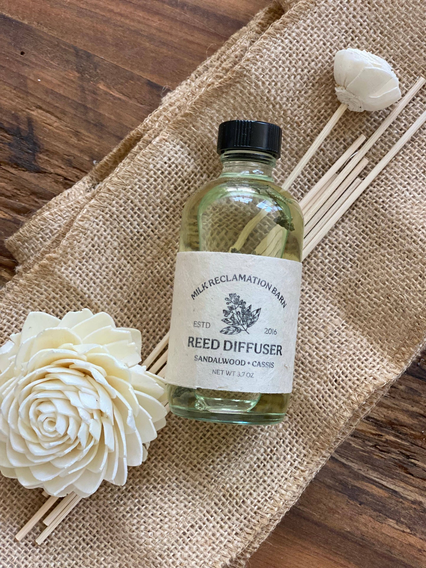 Reed Diffuser with Rattan Reeds and Sola Flowers: Sandalwood + Cassis